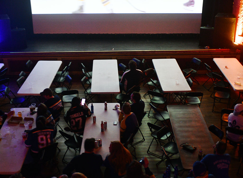 The Blue Note's main floor slowly loses fans as the Bruins increase their lead to 4-1